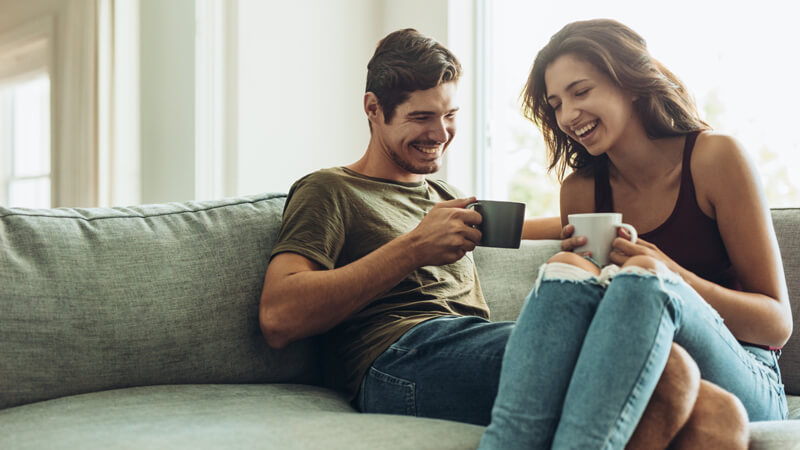 Happy couple having coffee